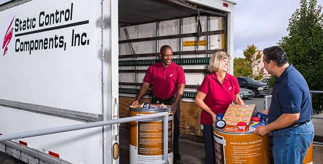 Static Control components being unloaded from a shipping truck